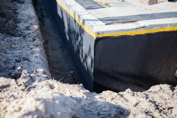 Professional Waterproofing technician working in Spring House, PA